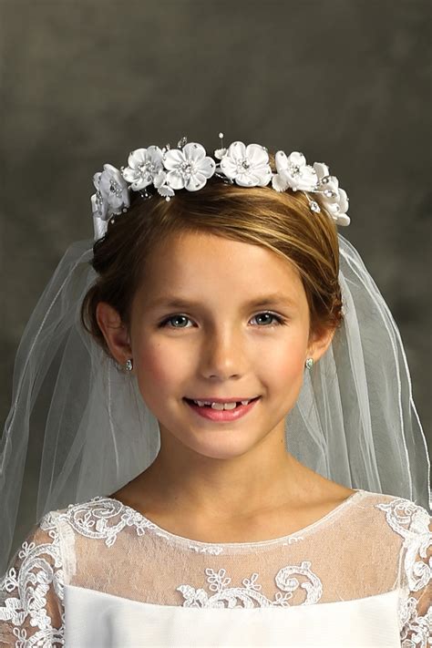 Asymmetric Messy Crown Braid Want this hairstyle Remember, it is ideal for girls with curlywavy and long hair. . Hairstyles for first communion with veil